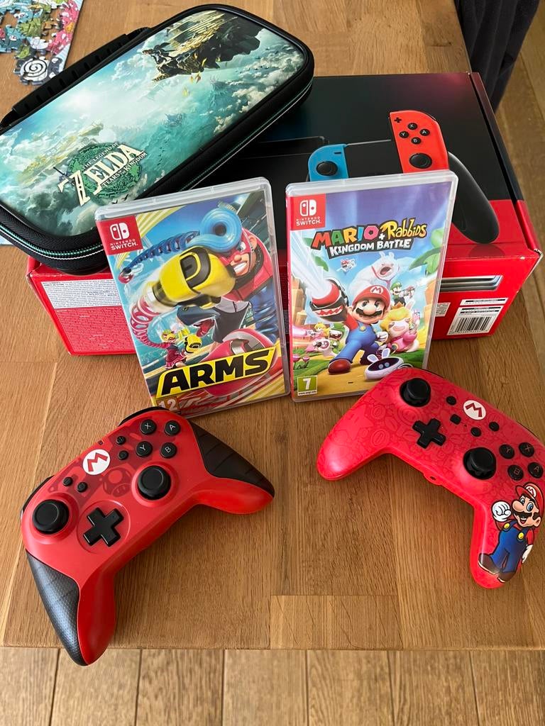 Nintendo switch + case + 2 games + 2 controllers + 265gb, Enlèvement