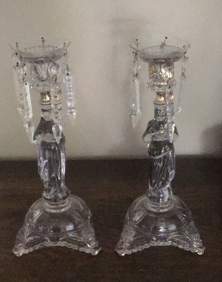 Glazen kandelaars, Ophalen