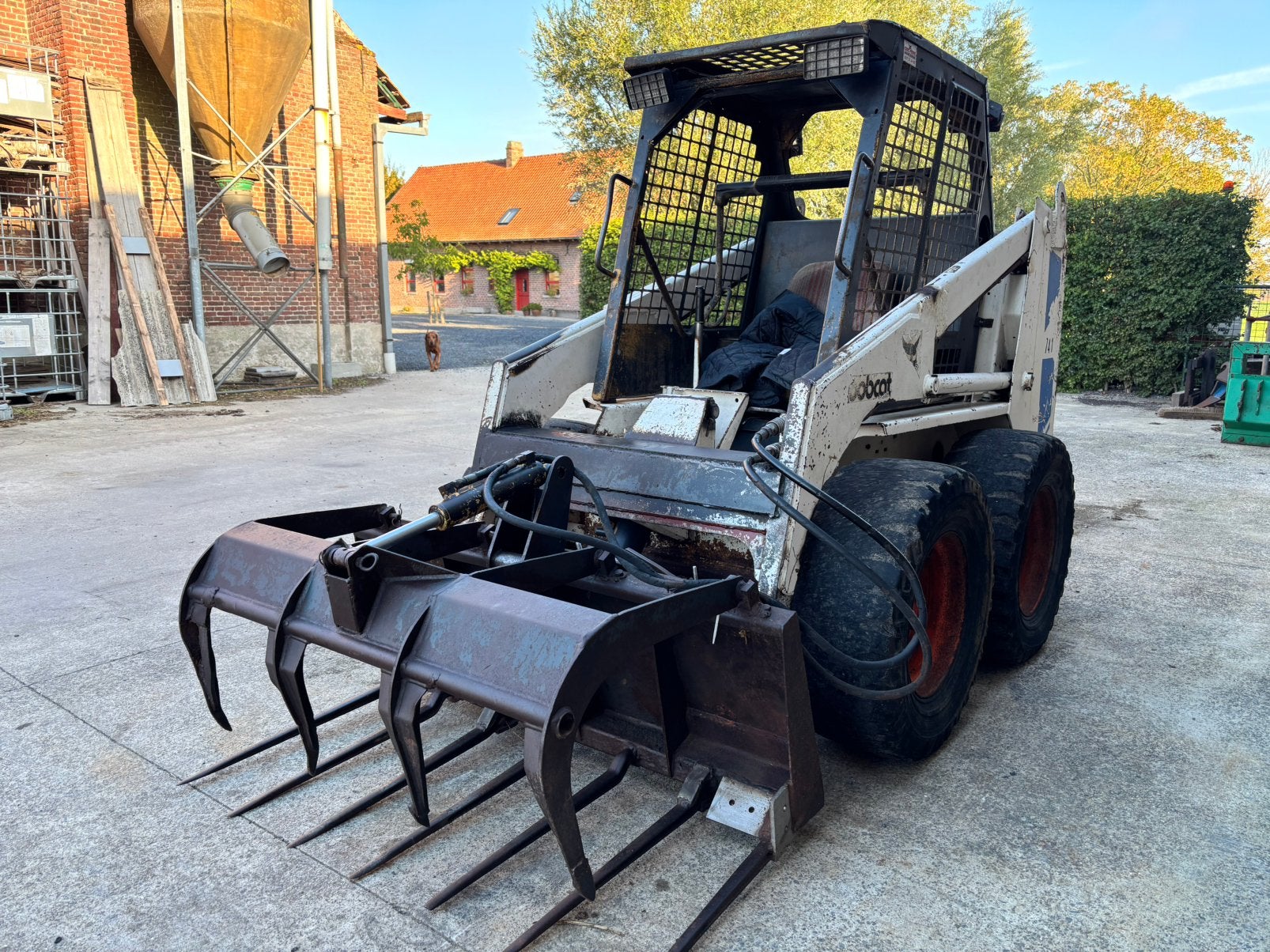 Bobcat 741 te koop met mestvork, Enlèvement, Chargeuse sur pneus ou Chouleur