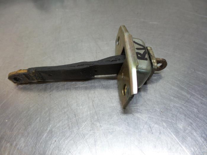Butée 2portes droite d'un Toyota Starlet (Starlet 95-), -, Toyota, Utilisé, -
