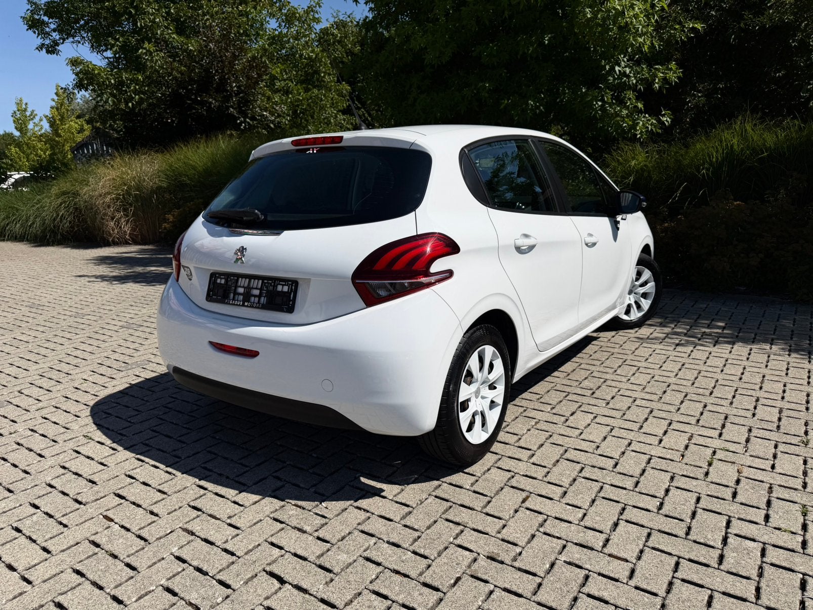 Peugeot 208 1.0i - 2016/091.000km/Euro 5 - Manueel, Auto's, Euro 5, Stof, 50 kW, Zwart