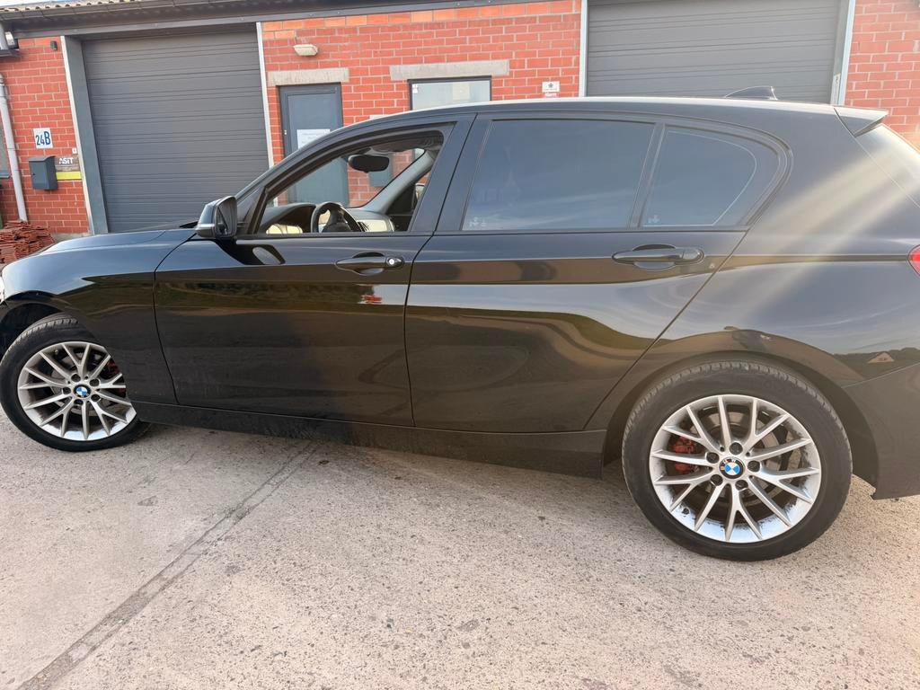BMW 1 SERIE 116i✅ BENZINE 2019 AIRCO GARANTIE, Auto's, 110 g/km, Zwart, 5 deurs, 3 cilinders