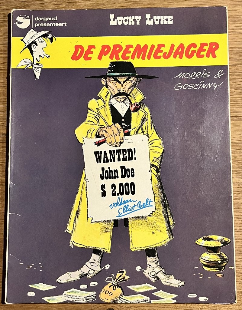 Lucky Luke - De premiejager - 9 1e dr (1974) Strip, Boeken, Eén stripboek, Ophalen of Verzenden, Gelezen