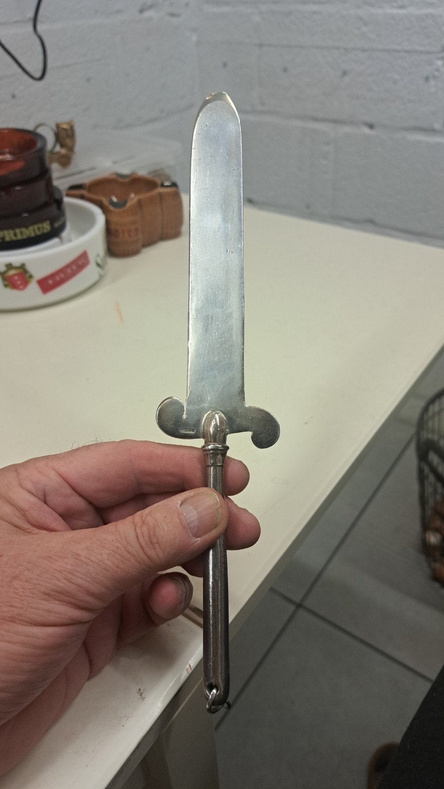 een zilveren briefopener of papierknijper merkteken, Ophalen of Verzenden