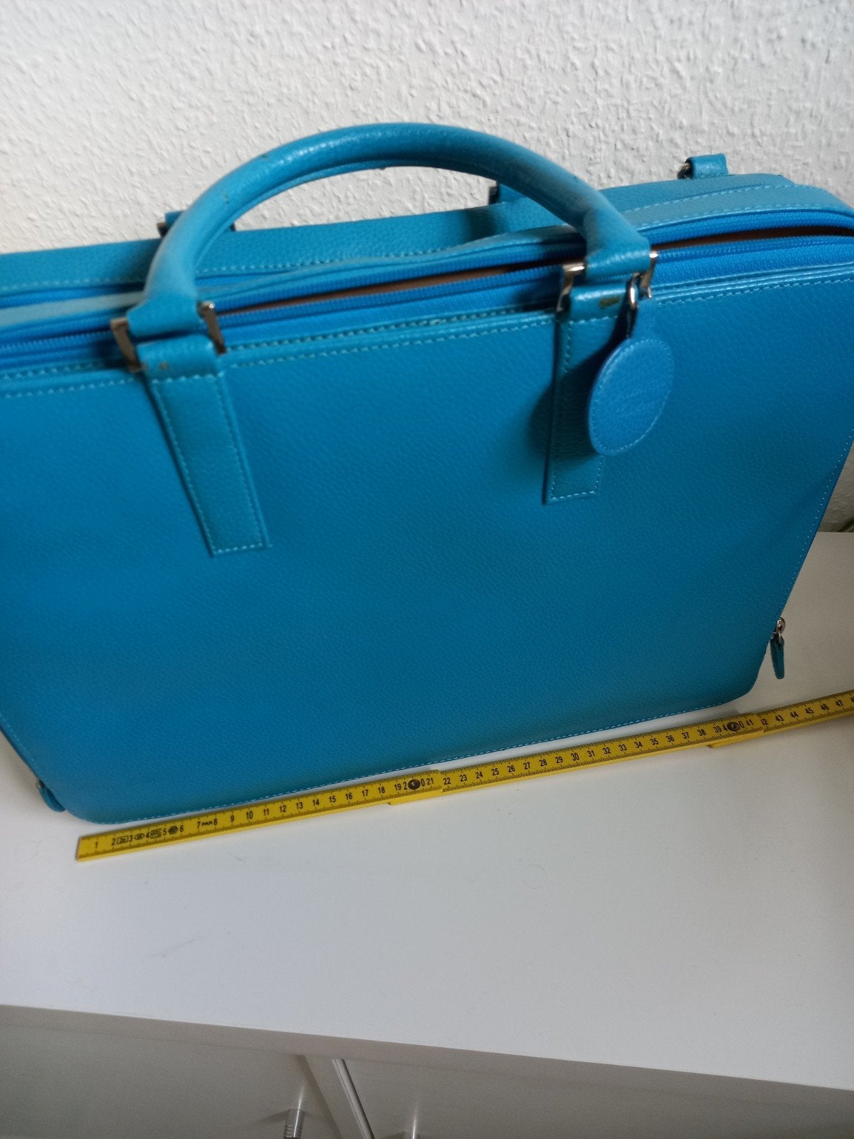 vintage boekentas, Ophalen