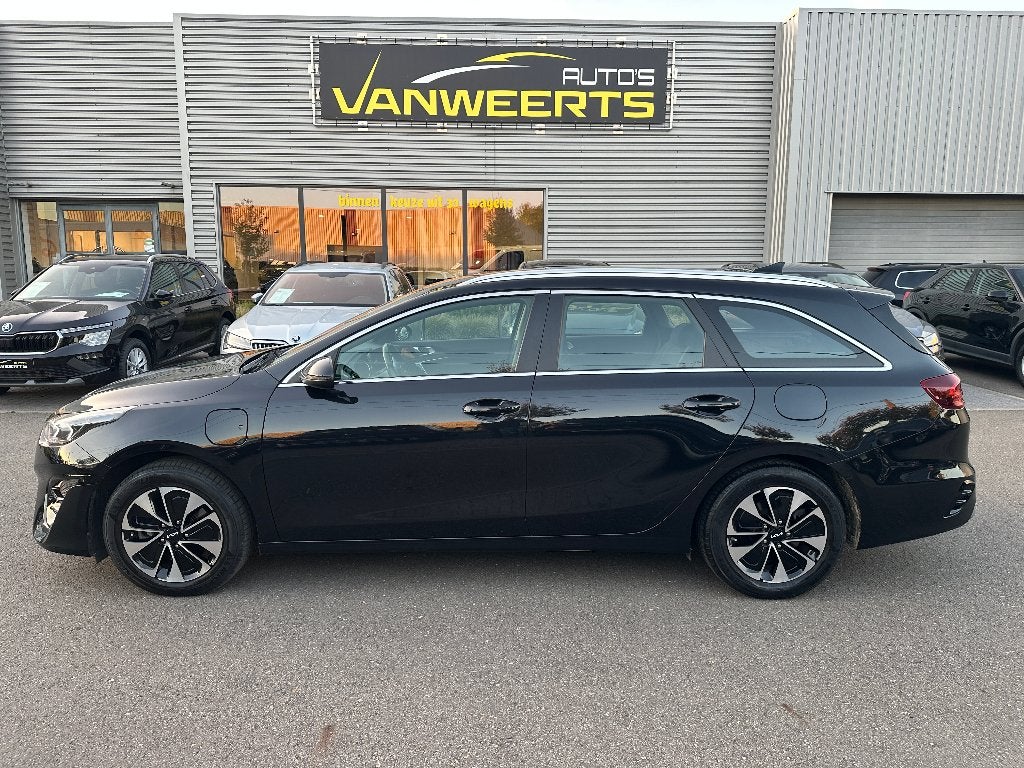 Kia Ceed SW, 1.6 benzine + elektrisch, plug-in hybride., Auto's, Dealer onderhouden, Stof, 1608 kg, 4 cilinders