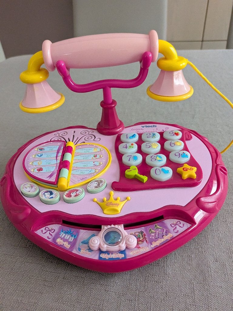V Tech telefoon met muziek en sprekend., Ophalen, Gebruikt