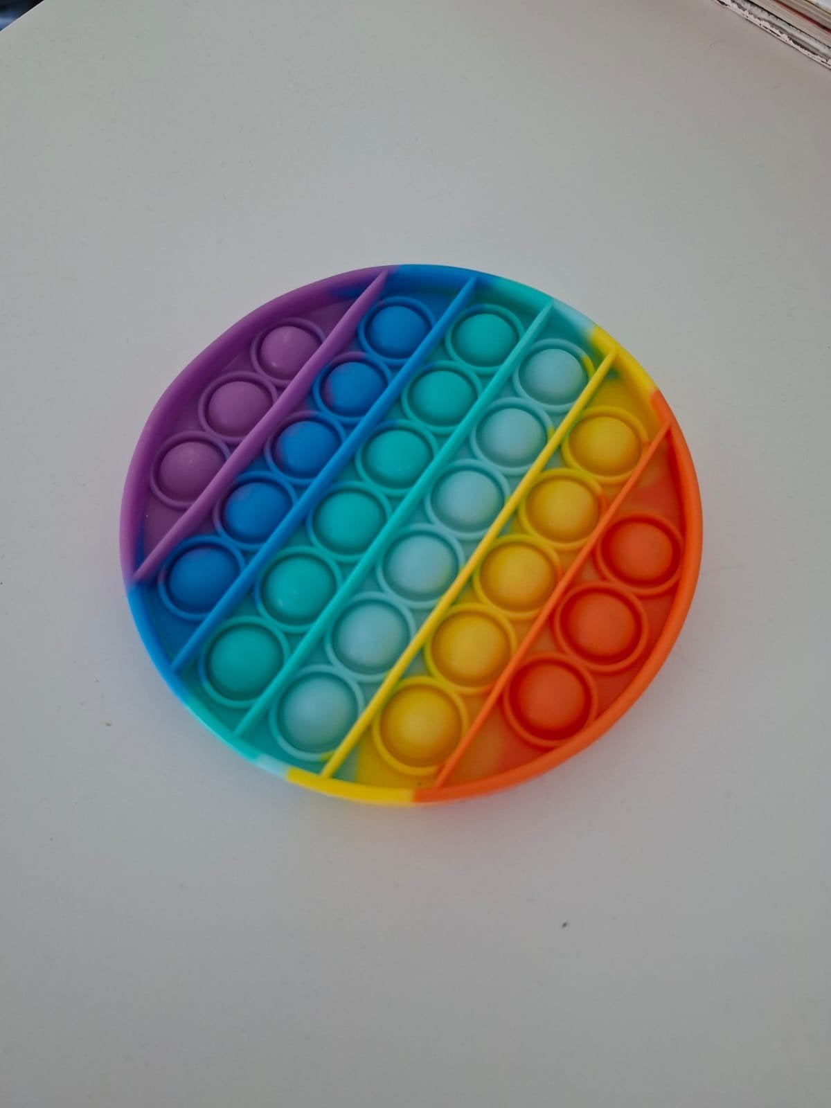 fidget regenboog pop it, Ophalen