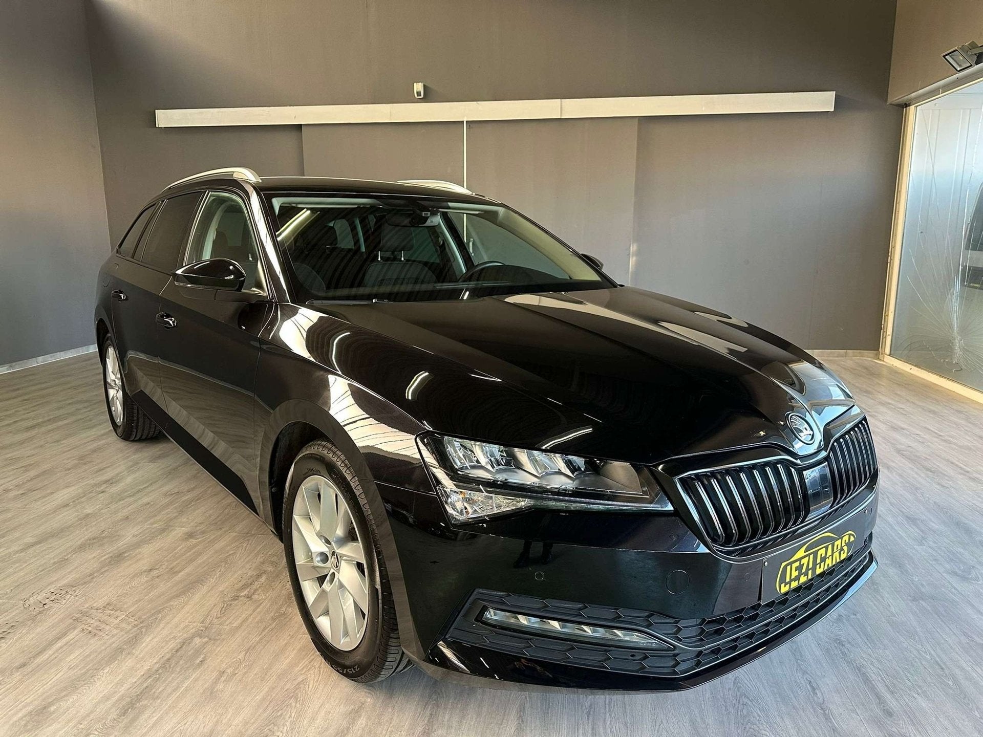 Skoda Superb Combi 2.0 TDI 4x4 DSG Ambition, Auto's, Automaat, Stof, Gebruikt, USB