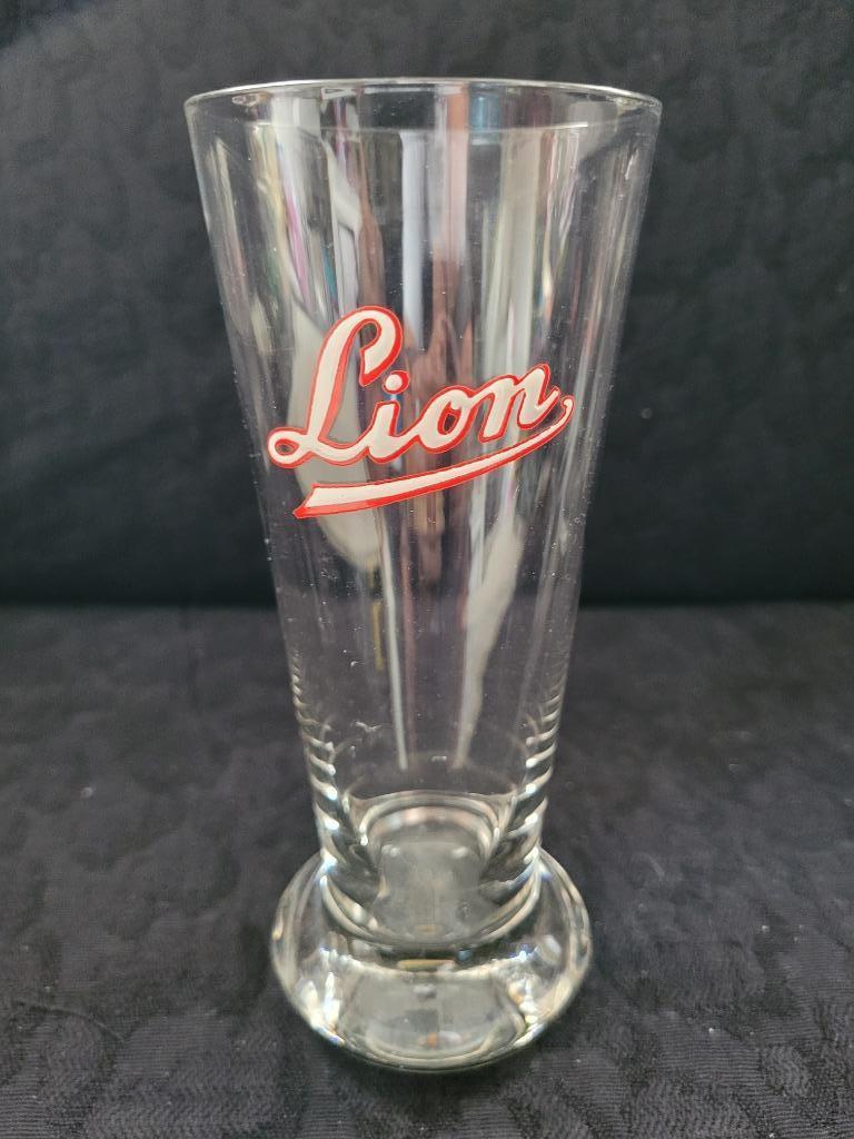 ancien verre à bière émaillé LION 33cl, Enlèvement ou Envoi, Comme neuf, Verre ou Verres, Autres marques