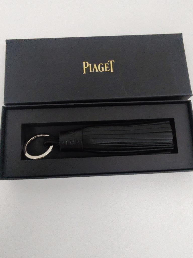 Piaget sleutelhanger, Envoi, Comme neuf, Marque