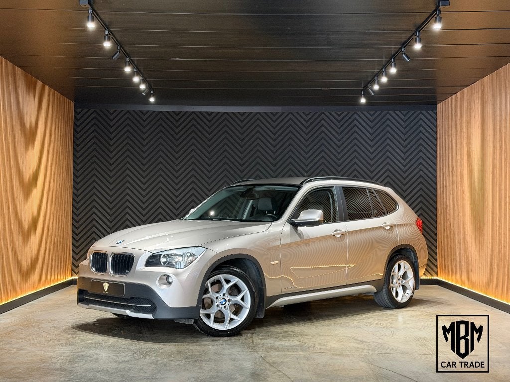 ✅ BMW X1 2.0d sDrive18 Navi CruiseC PDC 1.eig GARANTIE, Auto's, BMW, Euro 5, 1995 cc, Zwart, 4 cilinders