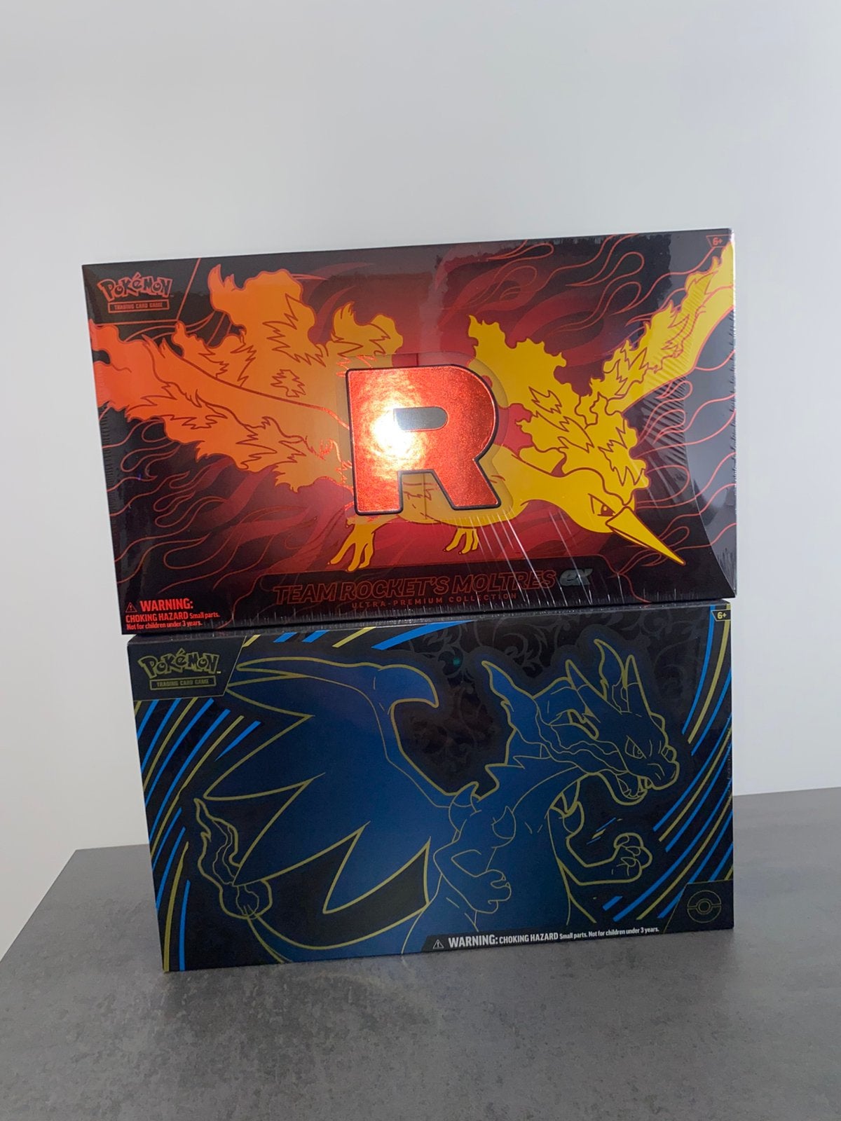 Mega charizard en moltres upc, Ophalen of Verzenden, Zo goed als nieuw
