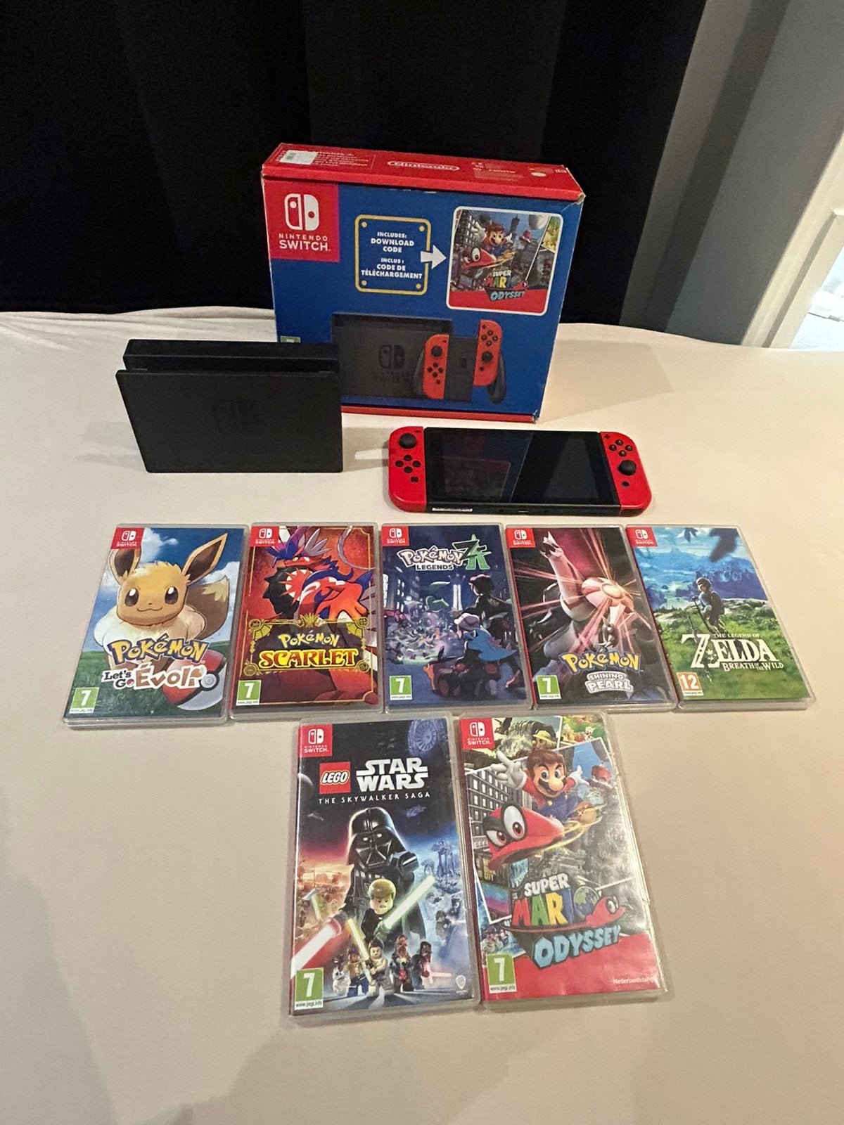 Nintendo Switch V2 Red Edition – Complete bundel + 7 games, Enlèvement ou Envoi, Comme neuf