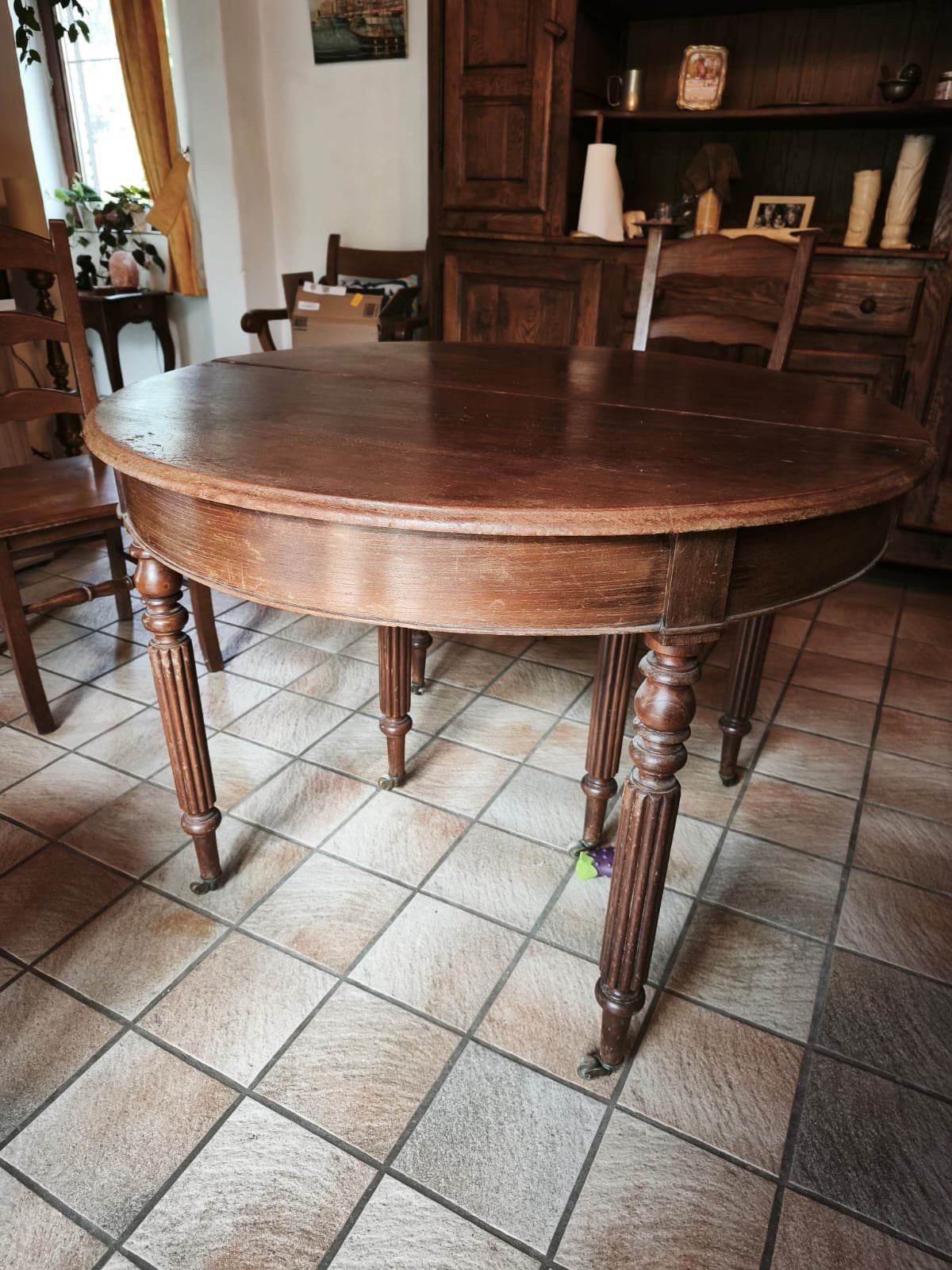 Table ronde avec allonges, Enlèvement