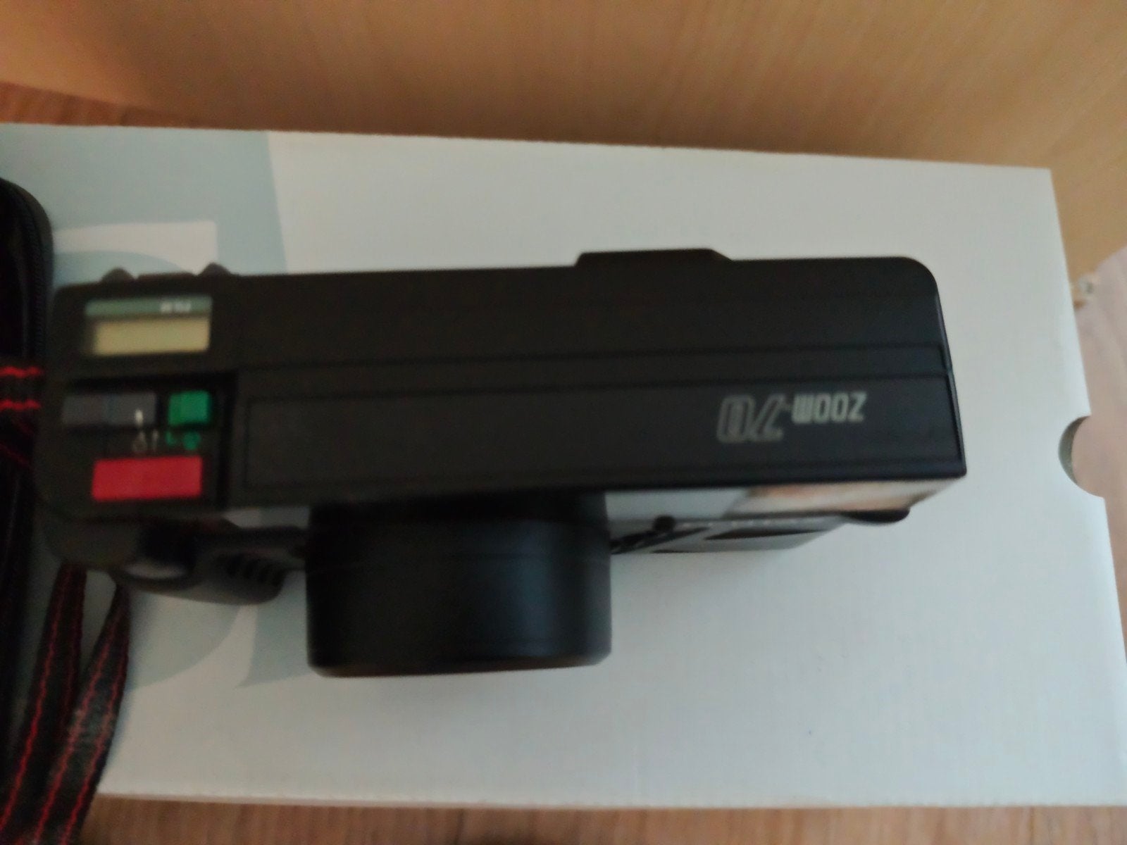 Pentax fototoestel met hoes, Ophalen
