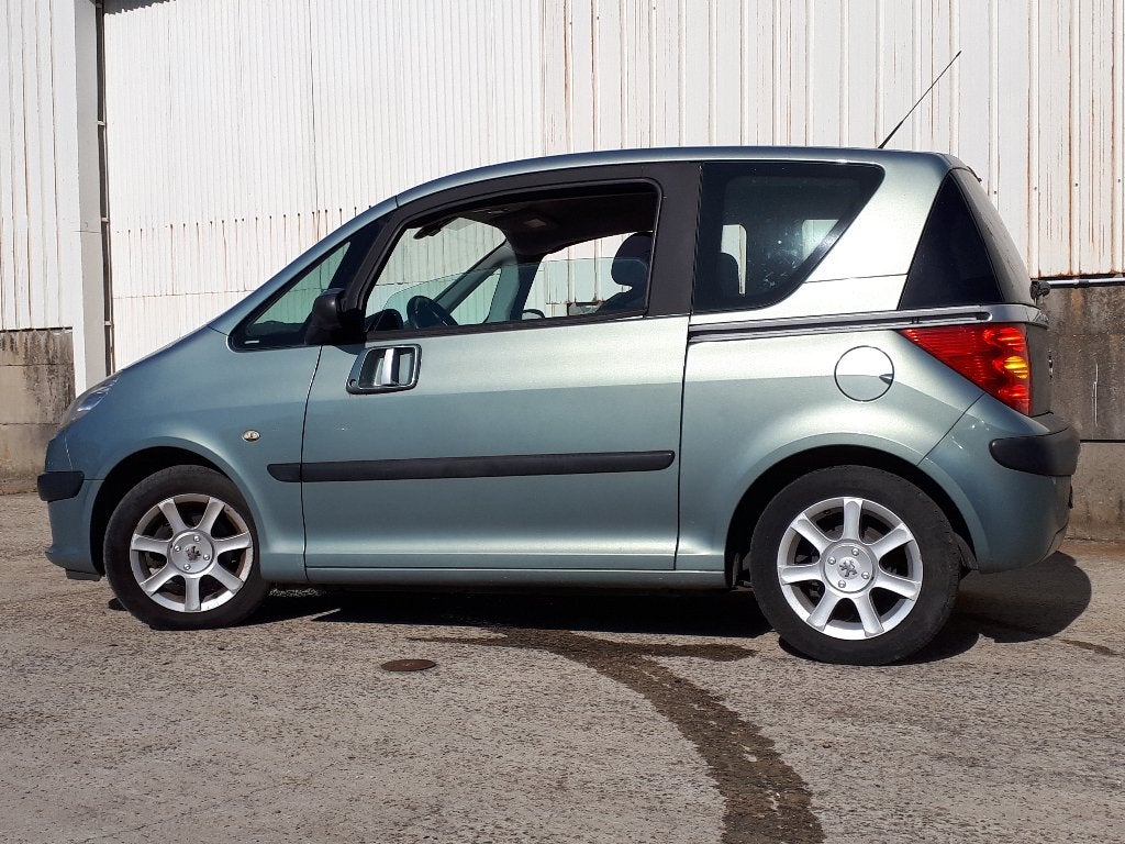 Peugeot 1007 1.4 benzine Bj 2005 136000km Airco, Auto's, Overige kleuren, Bedrijf, Grijs, 2 deurs