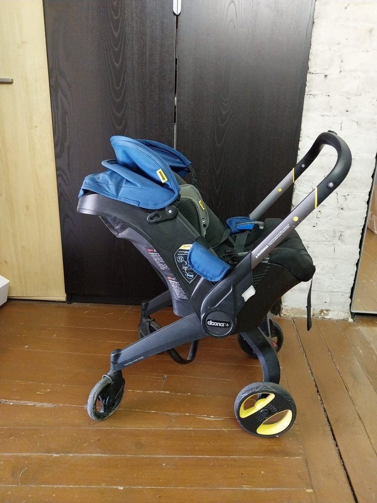 Doona+ – Siège auto et poussette 2-en-1 avec base Isofix, Enfants & Bébés, Enlèvement, Utilisé, Poussette combi, Autres marques