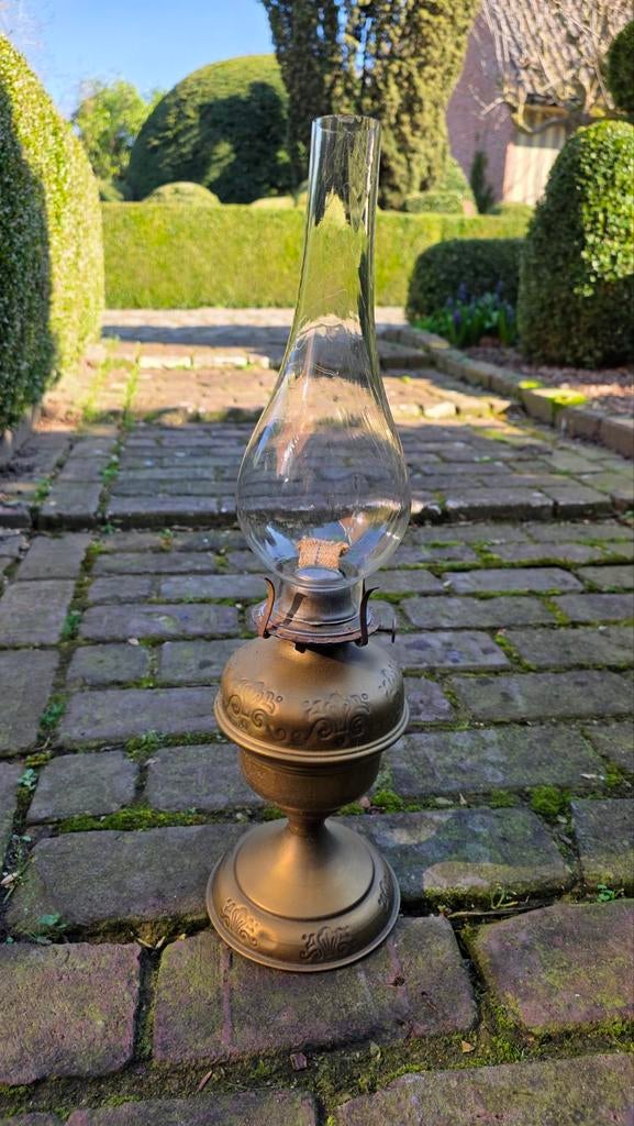 Olielampen met wiek, Ophalen