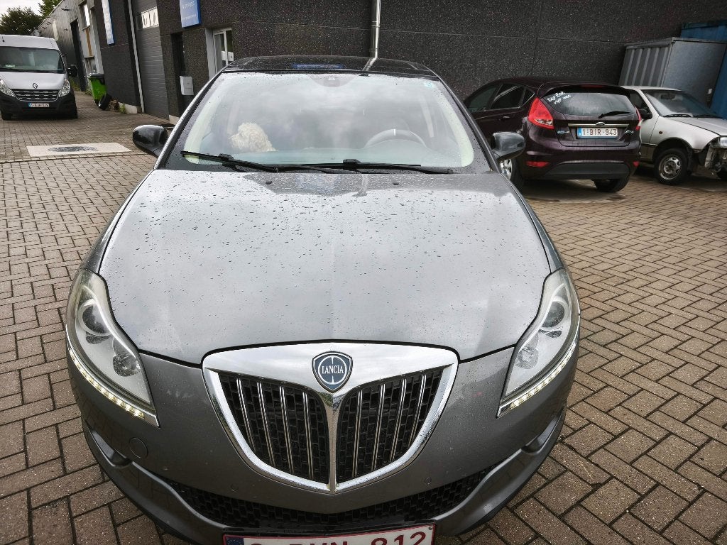 Lancia Delta 1,6JTD Automaat, Auto's, Euro 5, Zwart, 4 cilinders, Leder