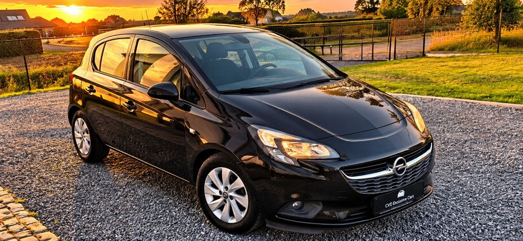 Opel Corsa 1.2i - Bluetooth - Dagrijverlichting - 12MGAR, Auto's, Voorwielaandrijving, Dealer onderhouden, Stof, 4 cilinders