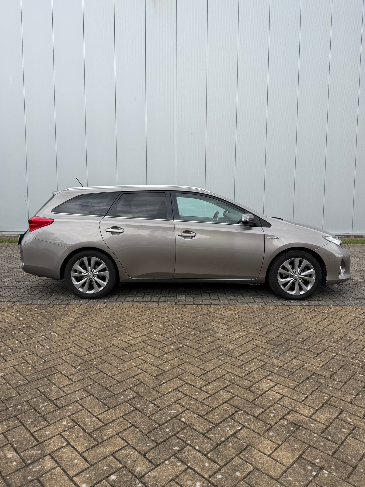 Toyota Auris Hybride, Auto's, Zwart, Leder en Stof, Bedrijf, Break