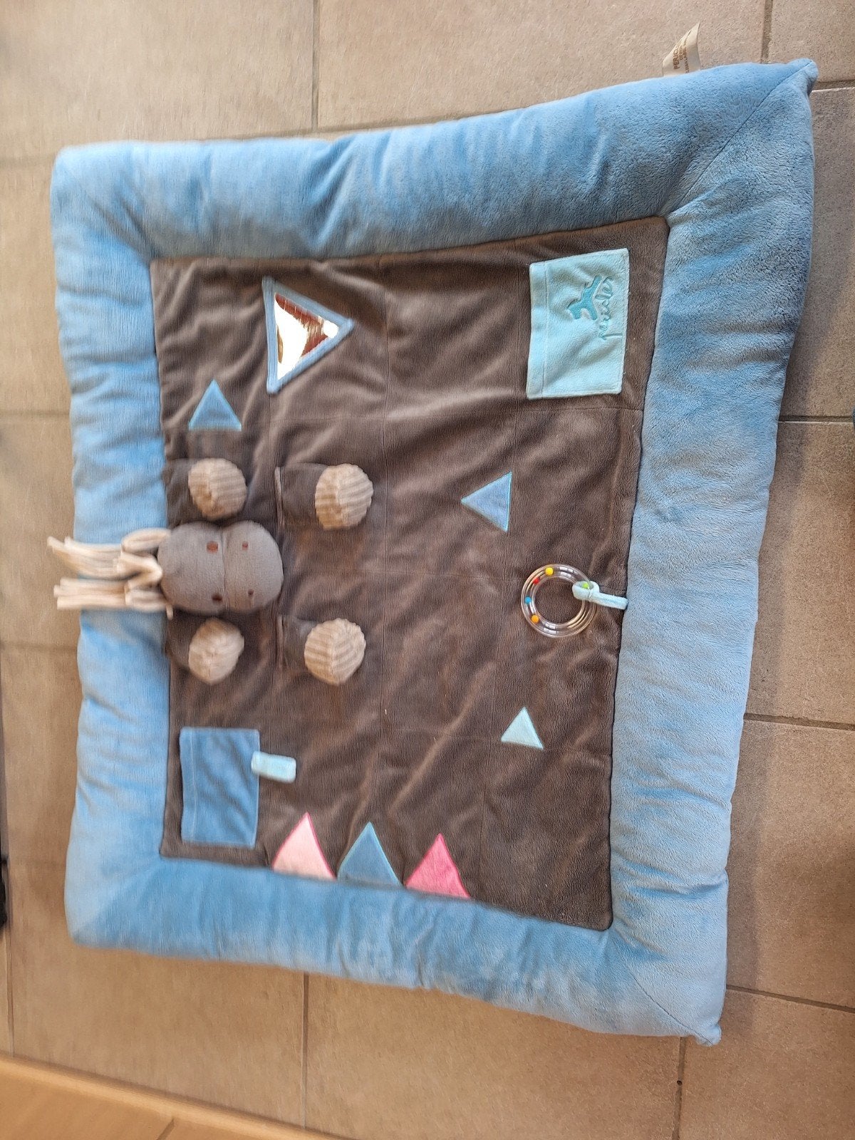 Activiteiten-speelkleed, Ophalen