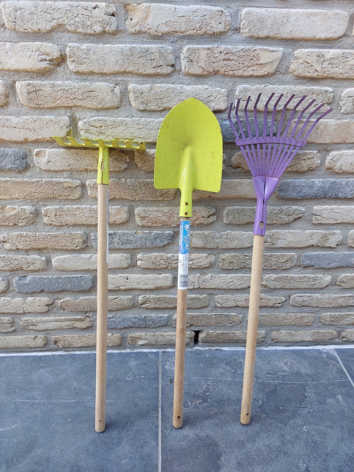 Hark, bladhark en schop kinderen, Ophalen