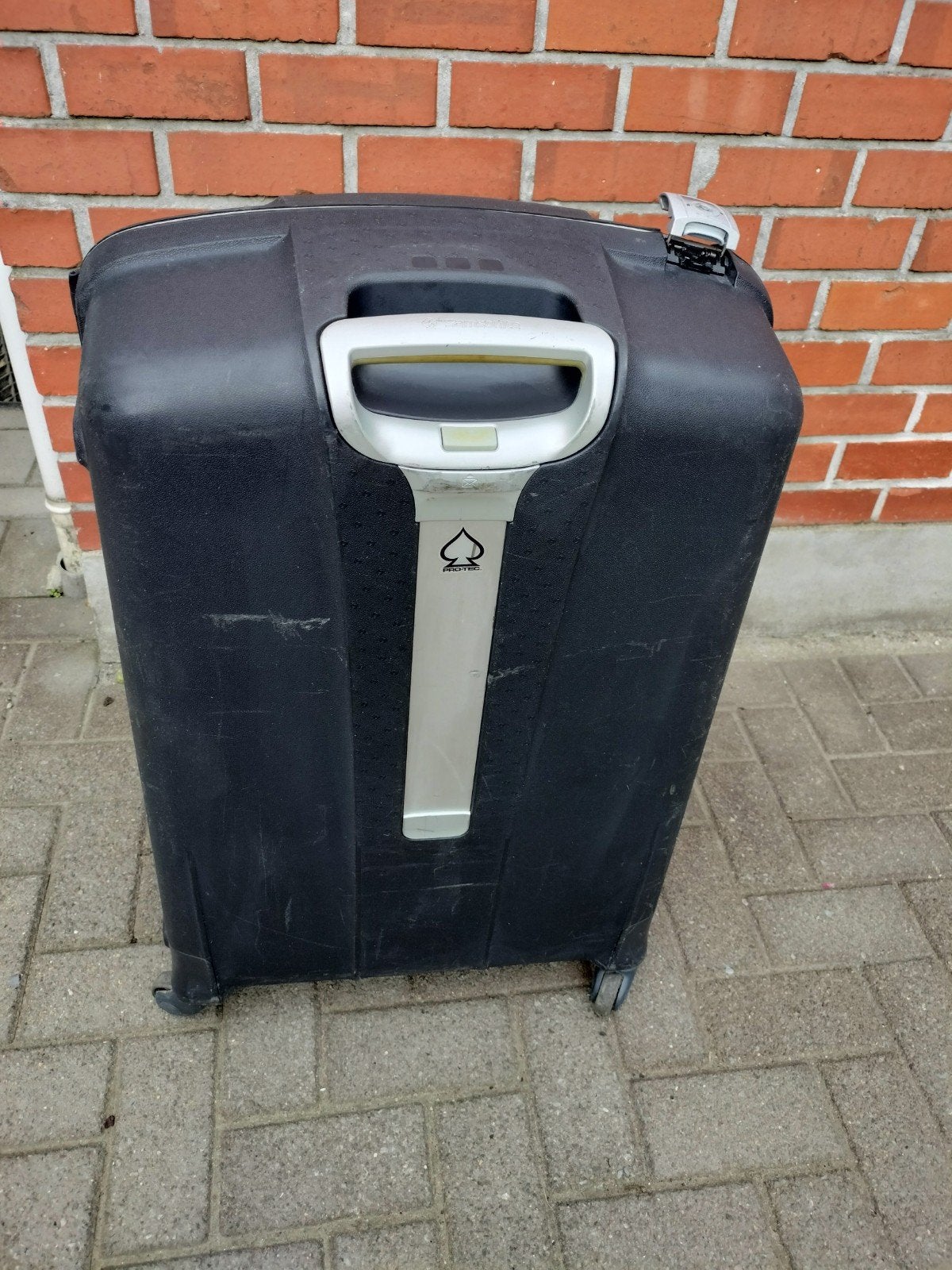 Reis koffer Samsonite, Ophalen