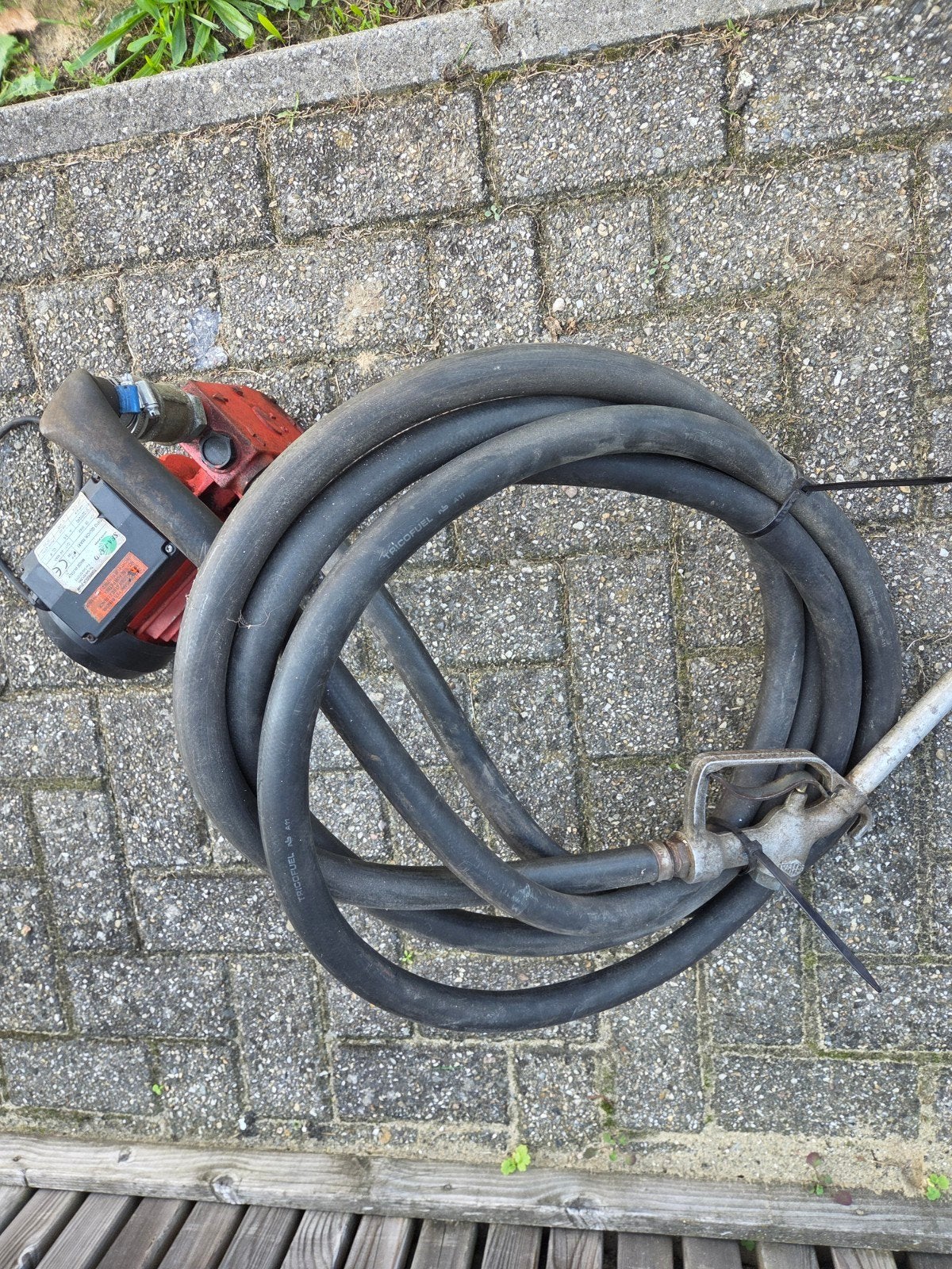 vloeistofpomp met pistool, Ophalen