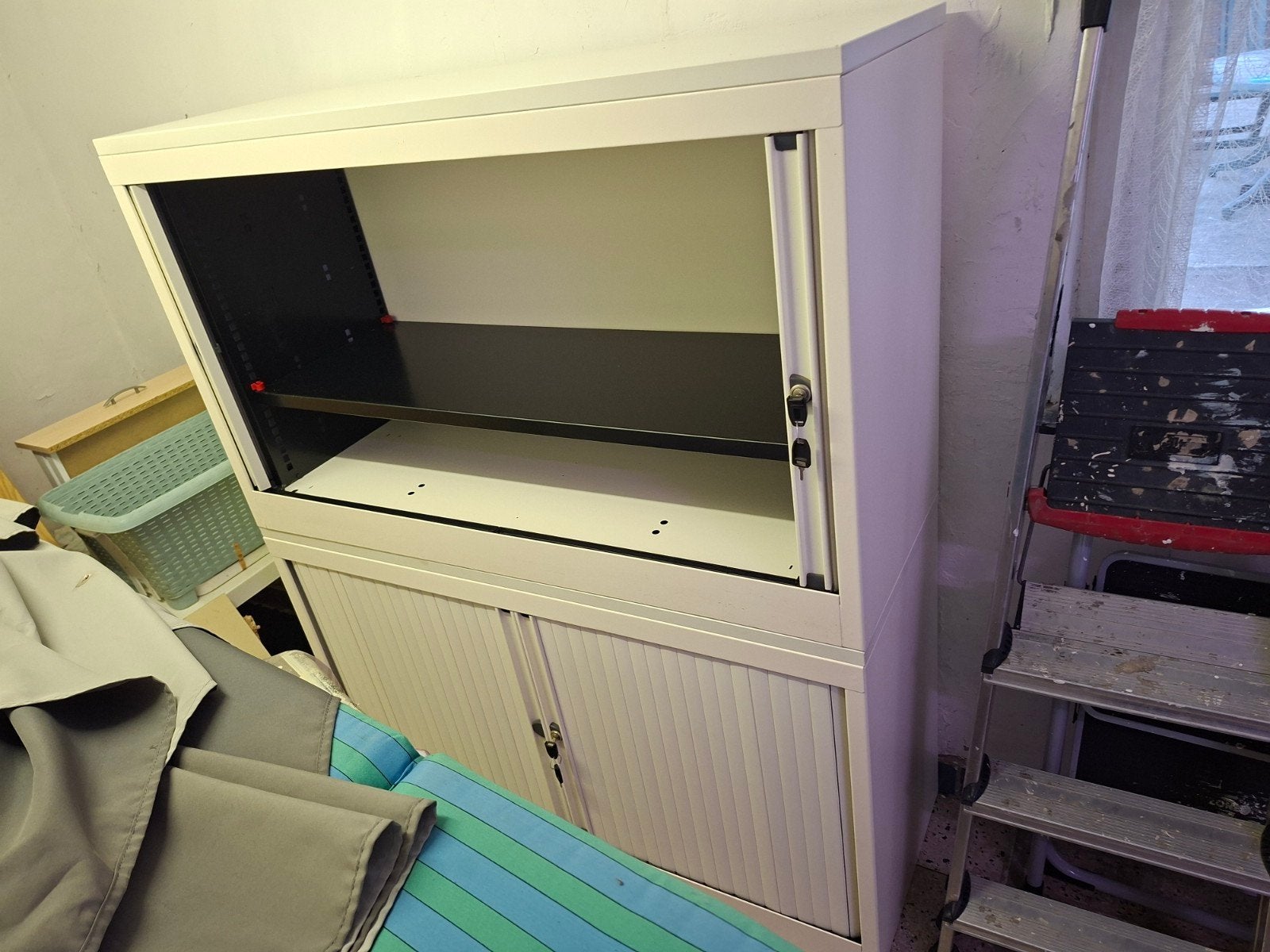 Archiefkast, Ophalen