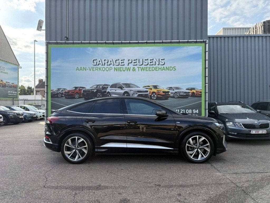 Audi Q4 Sportback e-tron 35 (bj 2023, automaat), Auto's, Automaat, Stof, Gebruikt, Zwart
