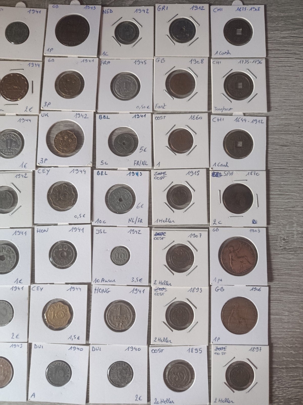 Wereldmunten in munthouder 664 stuks te koop, Enlèvement ou Envoi