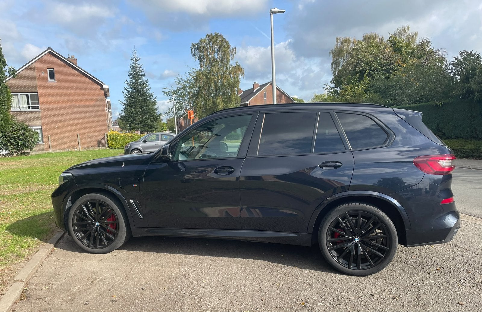 BMW X5 Plug-in hybride van 2021, Auto's, Automaat, Lichtsensor, Blauw, Leder