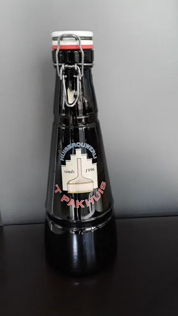 Oude grote bierfles / HUISBROUWERIJ 'T Pakhuis Antwerpen ., Ophalen of Verzenden