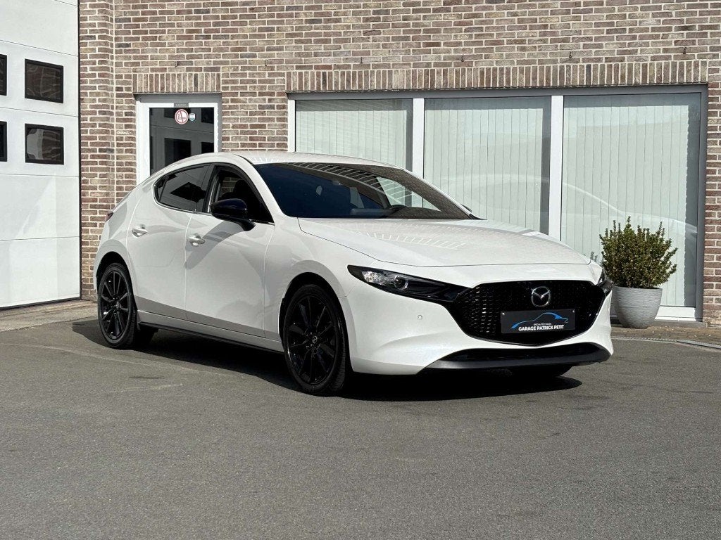 Mazda 3 2.0 M-HYBRID HOMURA / 19000km / Fabriekswb, Auto's, Voorwielaandrijving, Dealer onderhouden, Stof, 4 cilinders