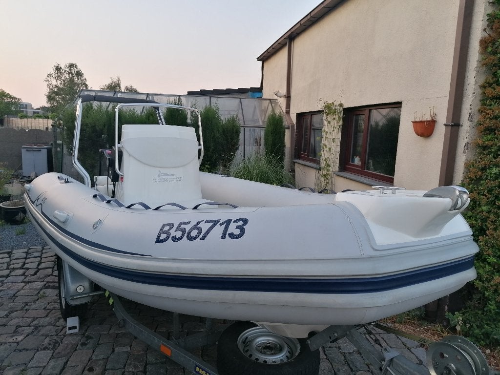 RIB ARIMAR, Evinrude motor en remork, TOP STAAT!!, Watersport en Boten, Rubberboten, 5 m, Zo goed als nieuw, 2 m, Zonnedek