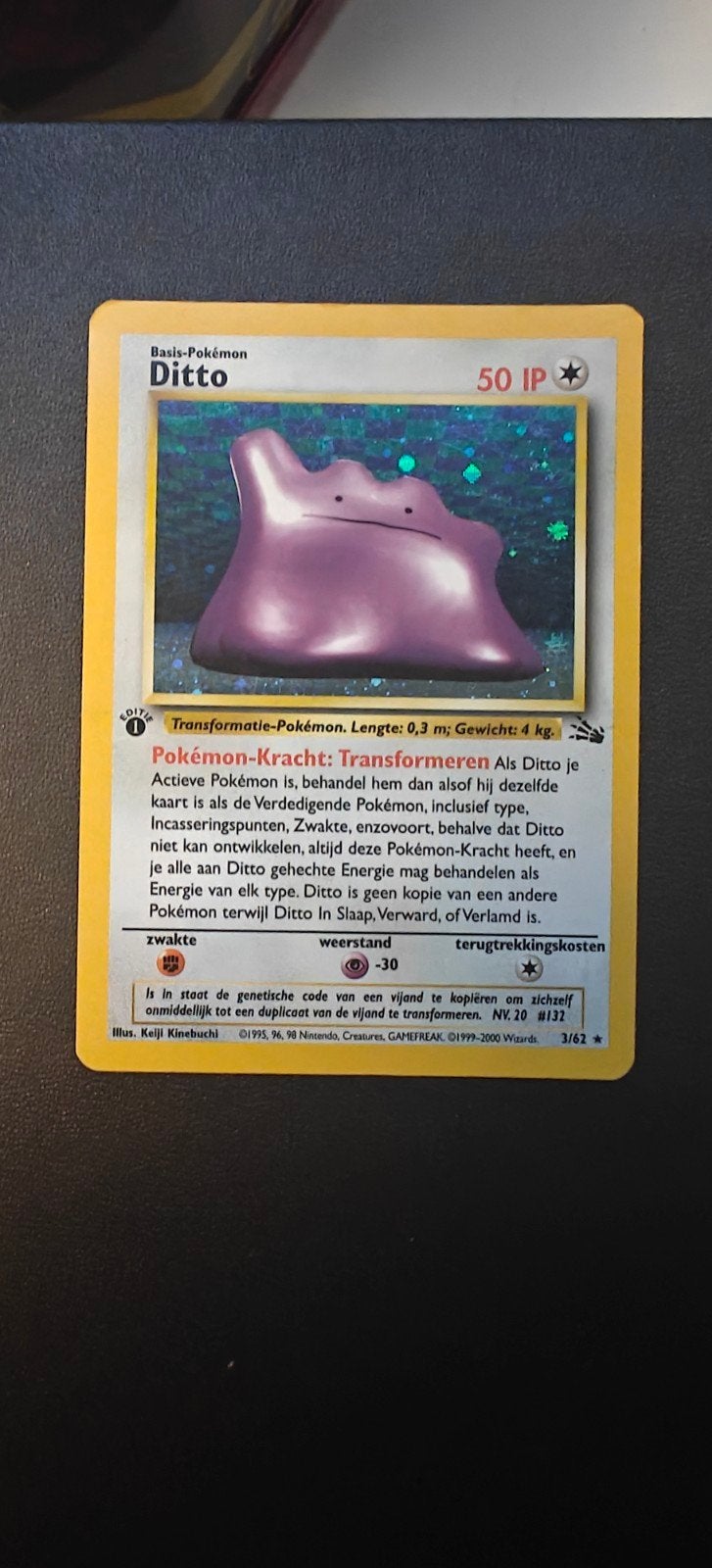 Ditto Holo - 1st edition NL Fossil, Hobby en Vrije tijd, Verzamelkaartspellen | Pokémon, Ophalen