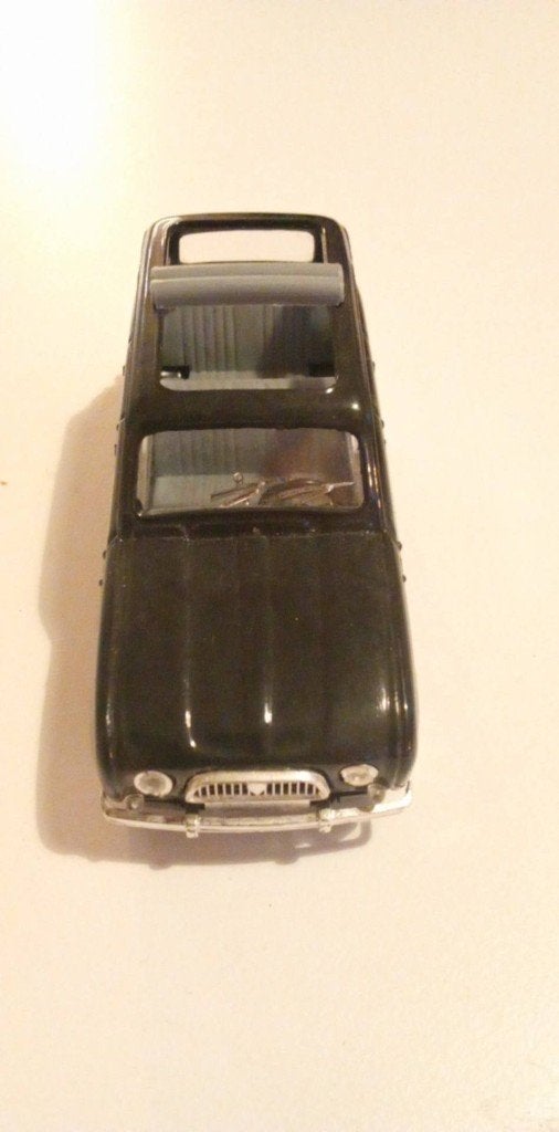 L'iconique Renault 4L « La Parisienne » (1964) Découvrable, Enlèvement ou Envoi, Utilisé, Voiture, Solido