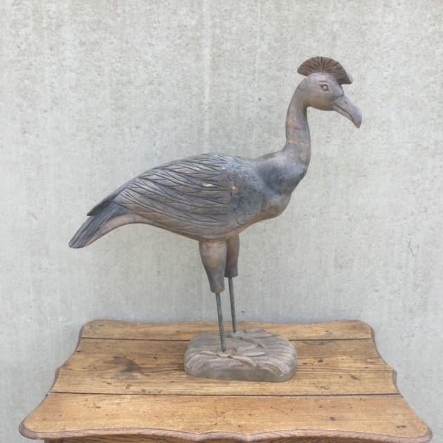 Houten vogel, Ophalen