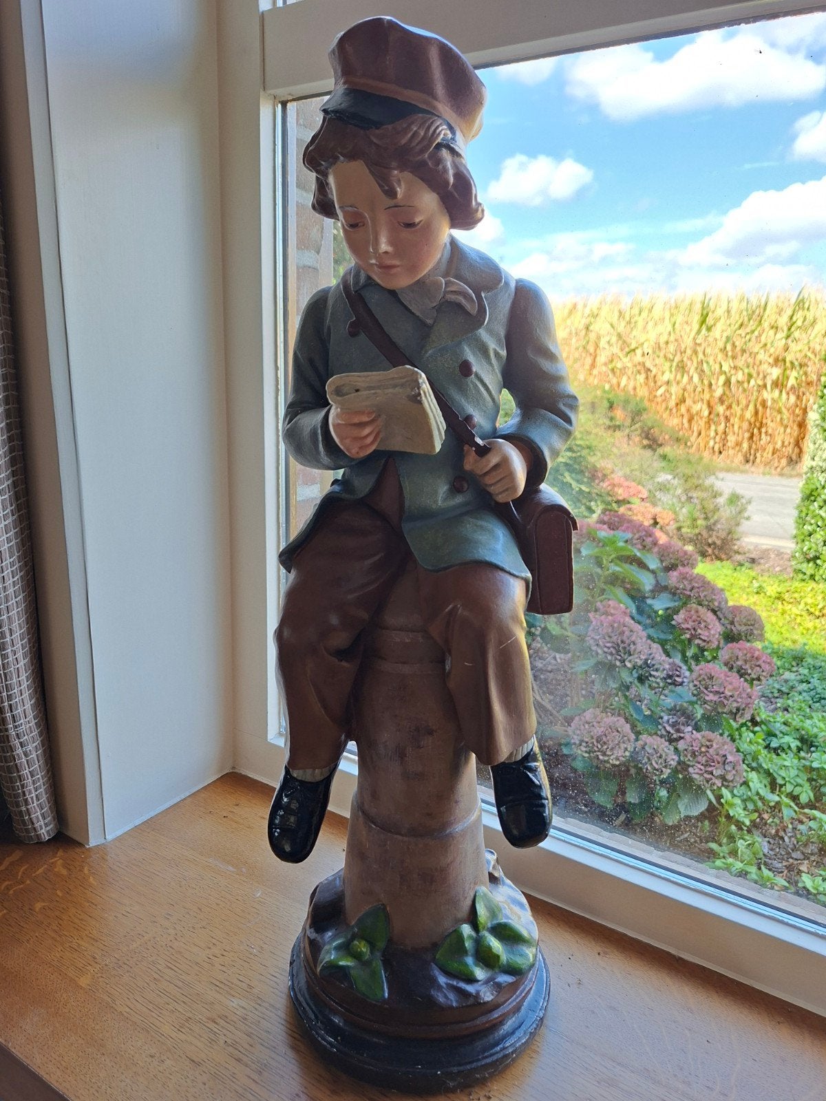 postbode (kalken beeld), Ophalen