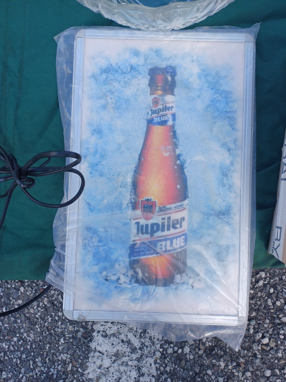Lichtreclame jupiler, Ophalen