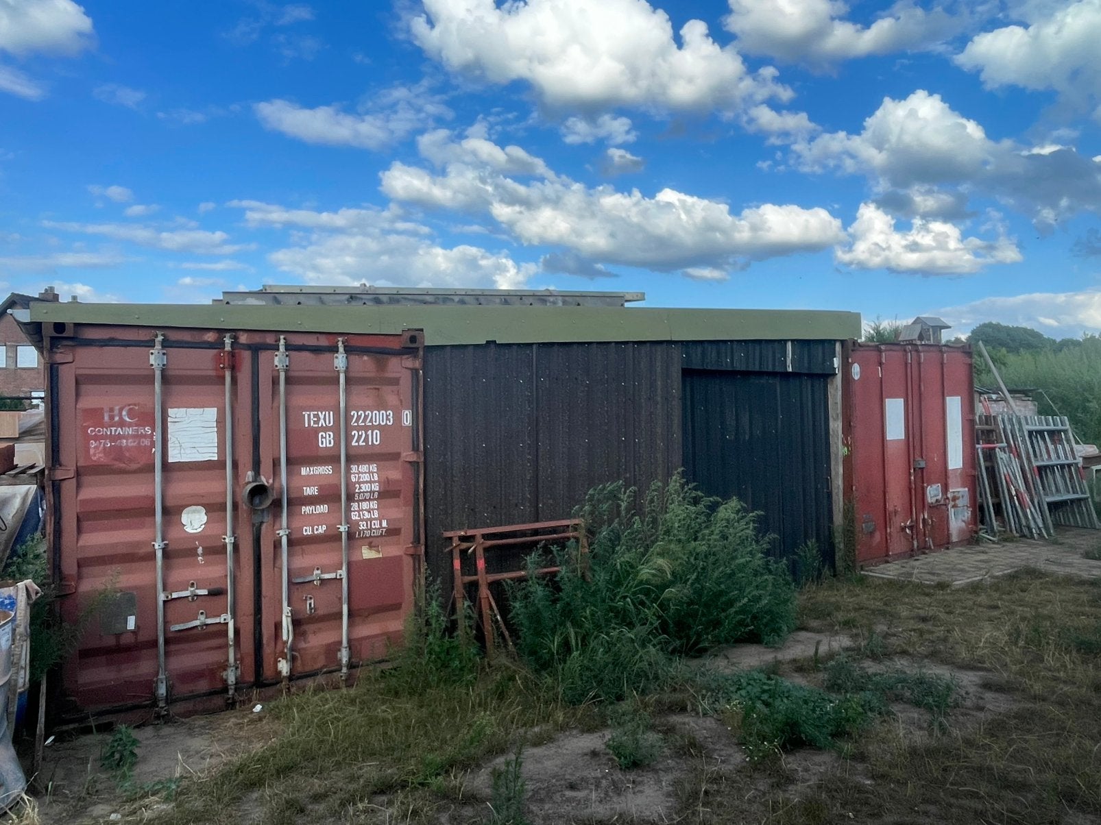 2 Containers met afdak, Ophalen