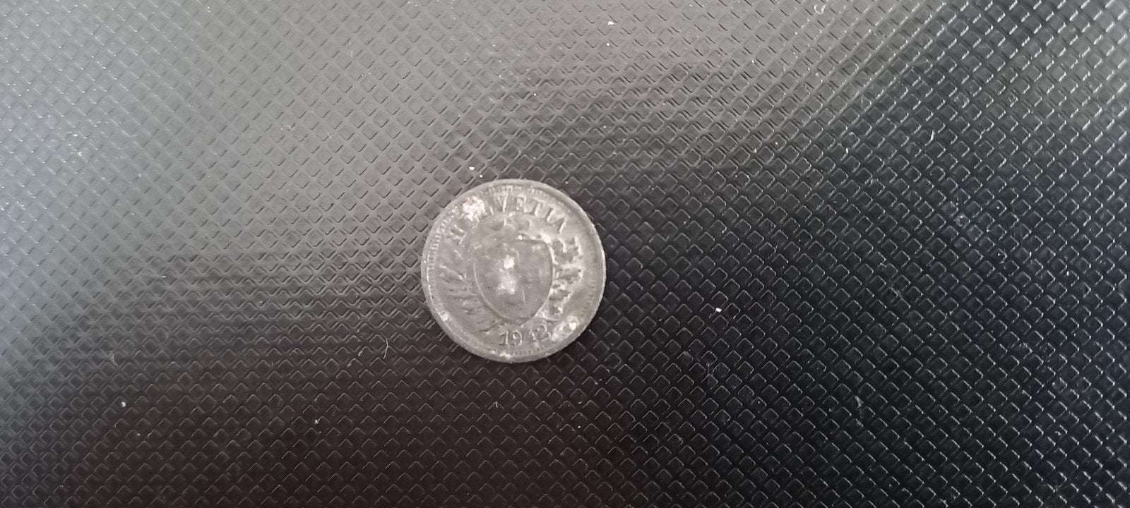Zwitsers muntje, Timbres & Monnaies, Enlèvement