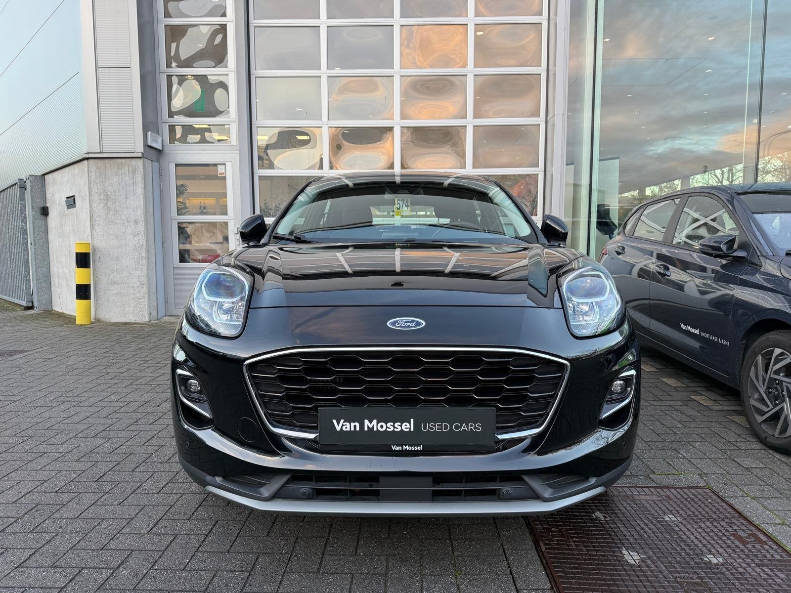Ford Puma Titanium - Camera - Carplay, Stof, https://public.car-pass.be/vhr/d3b1d4ff-9592-4427-b36e-b90d70c4806f, Zwart, Bedrijf