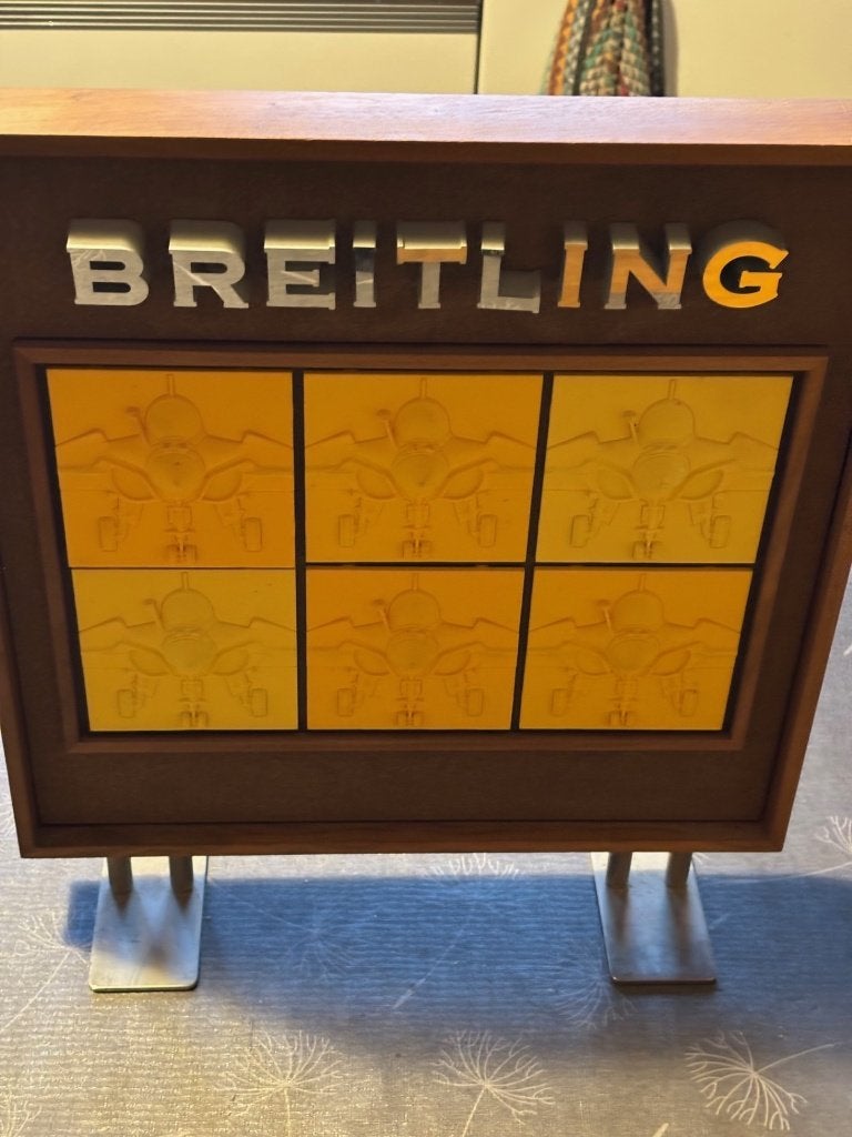 Présentoir Breitling – Bon état – 40x40 cm, Ophalen, Gebruikt, Reclamebord