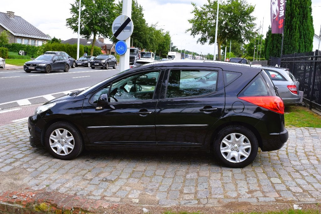 Peugeot 207 SW 1.4i/PANO/AIRCO/HISTORY/GARANTIE, Auto's, Voorwielaandrijving, Euro 5, Stof, Zwart