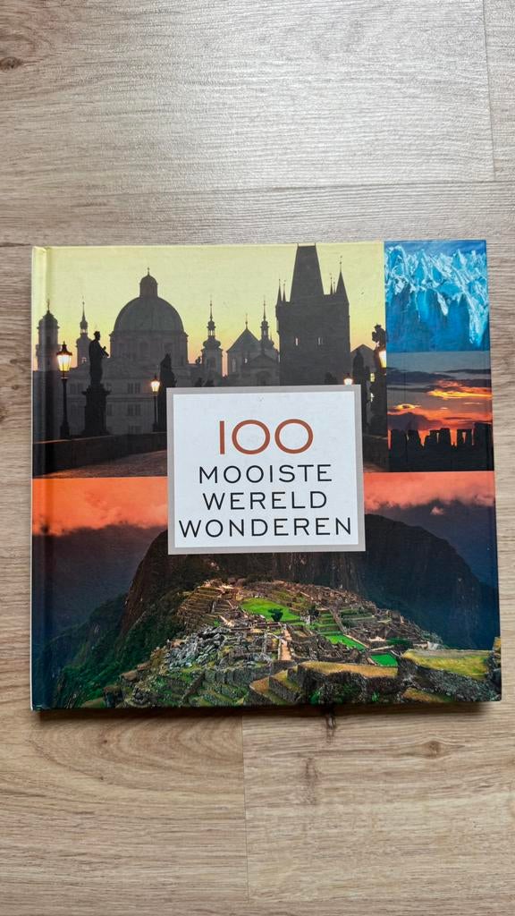 100 mooiste wereld wonderen . Prachtig geïllustreerd boek., Ophalen of Verzenden, Zo goed als nieuw