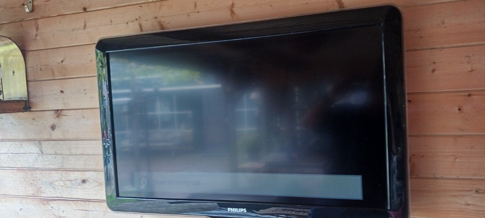 TV met afstand bediening en TV bescherming kader, Ophalen
