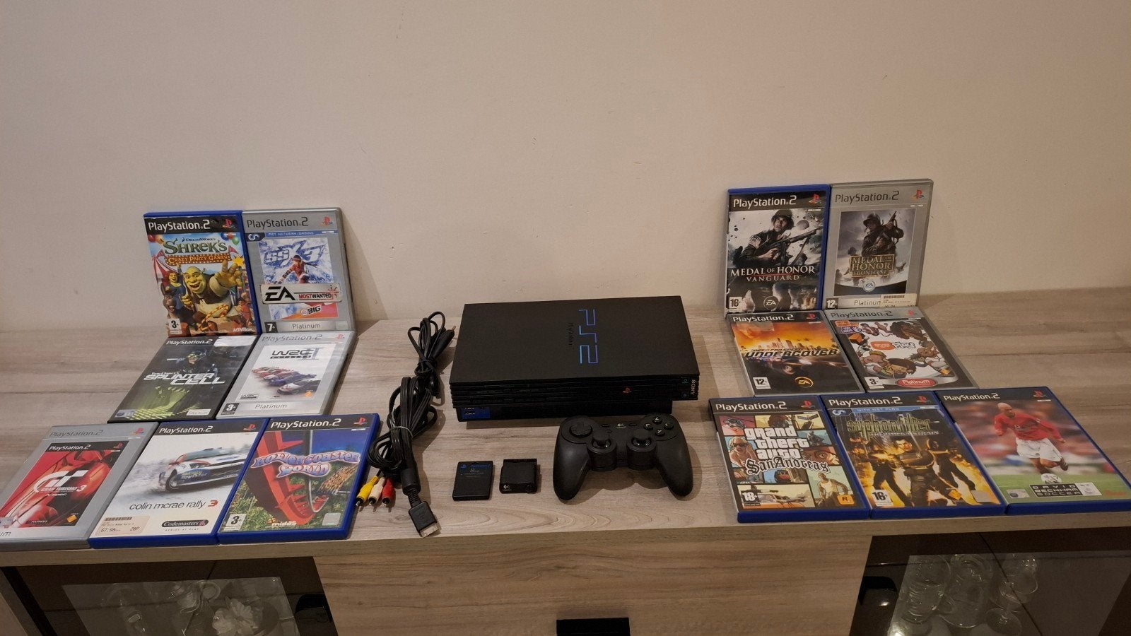 PlayStation 2 en très bonne état avec manette et 14 jeux, Enlèvement ou Envoi